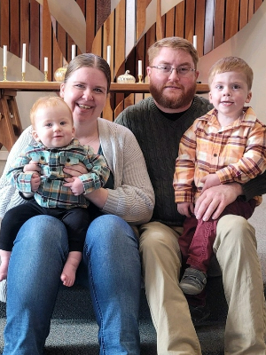 From left to right Kathy, Benjamin (born 1 month premature; stayed in Strong NICU), Dan & William